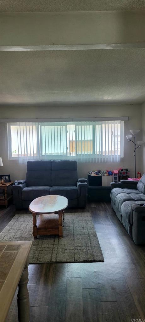 668 Farview St, El Cajon, CA 92021 - living room featuring hardwood / wood-style floors, plenty of natural light, and a textured ceiling