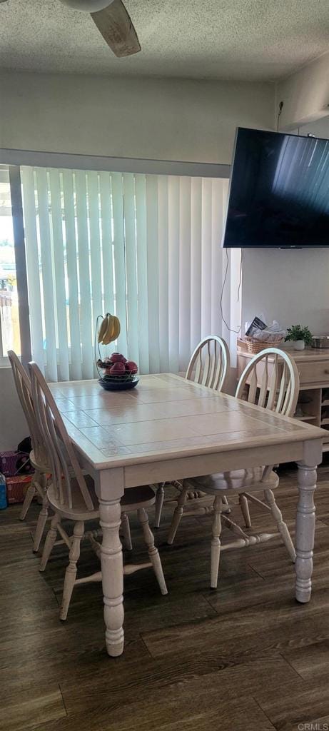 668 Farview St, El Cajon, CA 92021 - dining area with wood finished floors and a textured ceiling