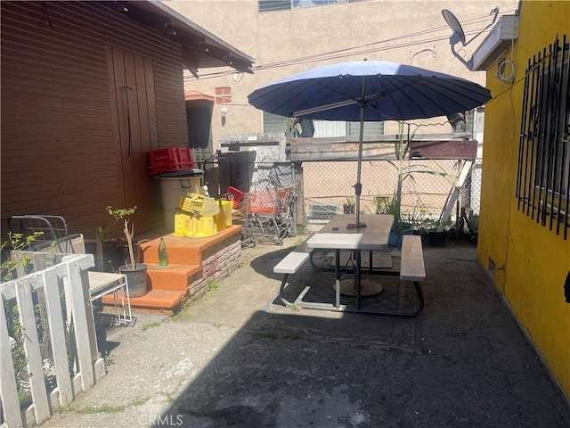 260 W 42nd Pl, Los Angeles, CA 90037 - view of patio with fence and outdoor dining space