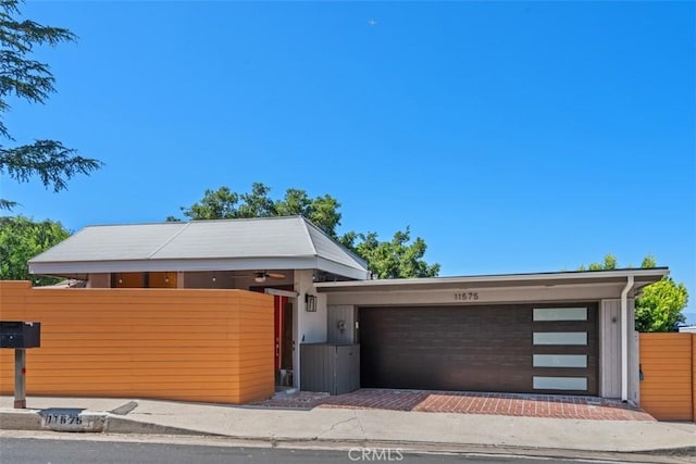 11575 Sunshine Ter, Studio City, CA 91604 - modern home featuring fence and a garage