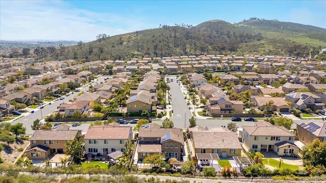 aerial perspective of suburban area with a mountain backdrop