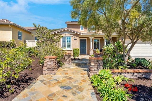 view of front of home featuring stucco siding