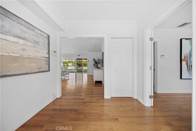 1212 Oakwood Dr, Arcadia, CA 91006 - corridor featuring light wood-type flooring, ornamental molding, and baseboards