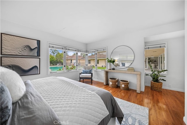 1212 Oakwood Dr, Arcadia, CA 91006 - bedroom featuring wood finished floors and baseboards