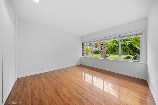 1212 Oakwood Dr, Arcadia, CA 91006 - unfurnished room with wood finished floors and baseboards
