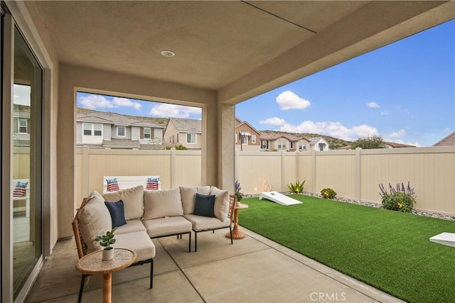 view of patio / terrace with a residential view and an outdoor hangout area