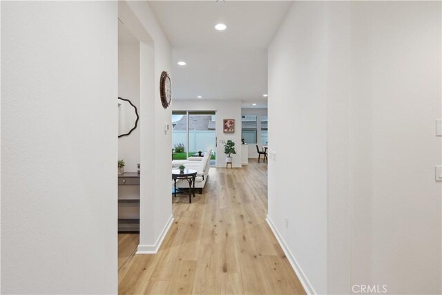 18100 Tableau Way, Saugus, CA 91350 - hallway with light wood finished floors, recessed lighting, and baseboards
