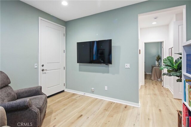18100 Tableau Way, Saugus, CA 91350 - sitting room with light wood-style flooring, recessed lighting, and baseboards