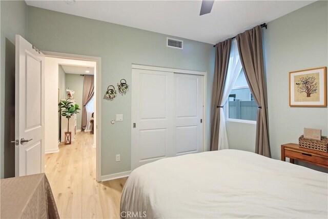 18100 Tableau Way, Saugus, CA 91350 - bedroom featuring light wood-style floors, a closet, baseboards, and ceiling fan