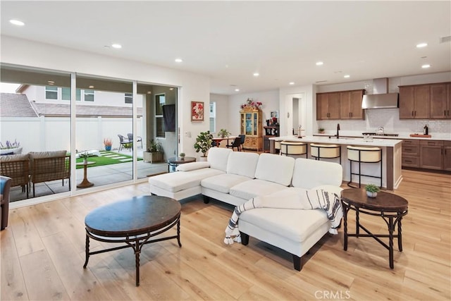 18100 Tableau Way, Saugus, CA 91350 - living room featuring light wood-style floors and recessed lighting