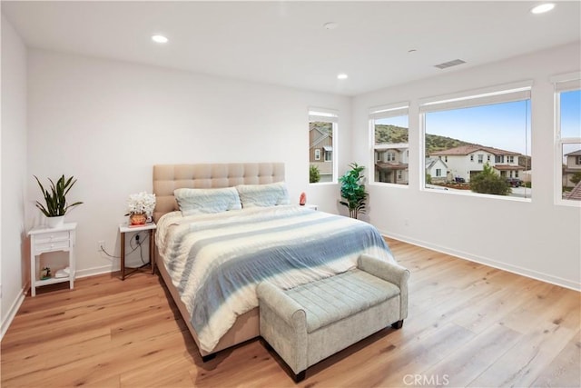 18100 Tableau Way, Saugus, CA 91350 - bedroom with light wood finished floors, recessed lighting, and baseboards
