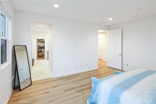 18100 Tableau Way, Saugus, CA 91350 - bedroom featuring light wood-style flooring, recessed lighting, and baseboards