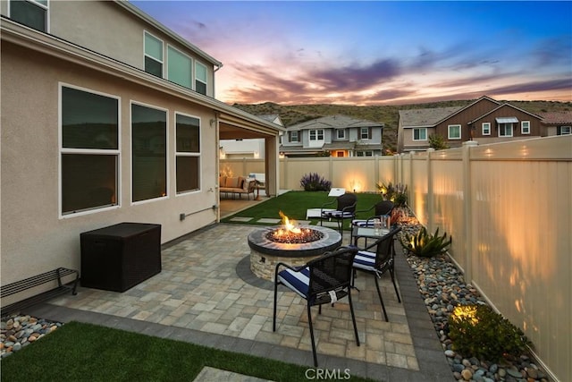 18100 Tableau Way, Saugus, CA 91350 - fenced backyard with an outdoor fire pit, a patio, and a residential view