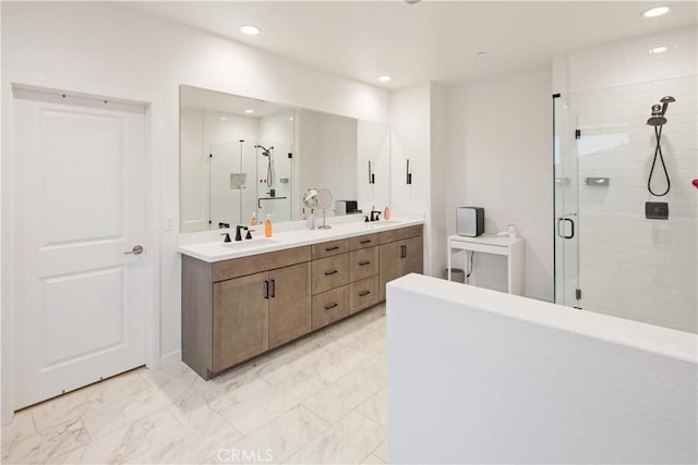 bathroom featuring a stall shower, marble finish flooring, recessed lighting, and double vanity