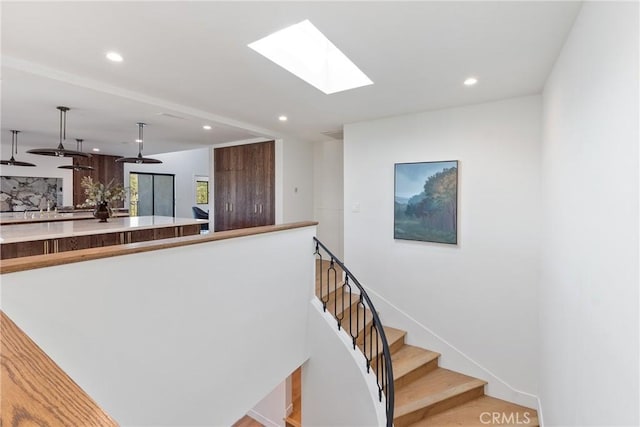 3250 Coldwater Canyon Ave, Studio City, CA 91604 - stairs with recessed lighting and a skylight
