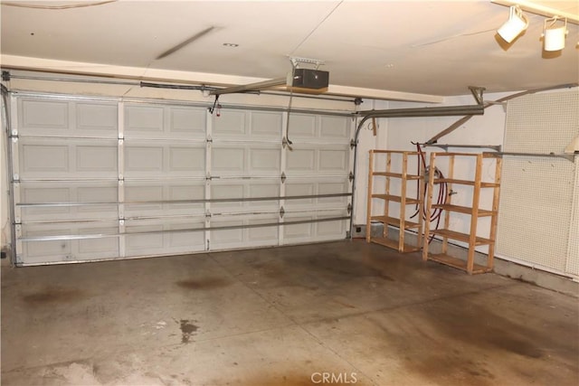 1044 Turner Ave Unit 207, Ontario, CA 91764 - garage with a garage door opener