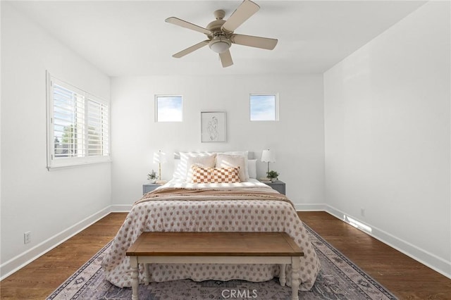 121 Wawona Pl, Chico, CA 95928 - bedroom with multiple windows, baseboards, wood finished floors, and a ceiling fan