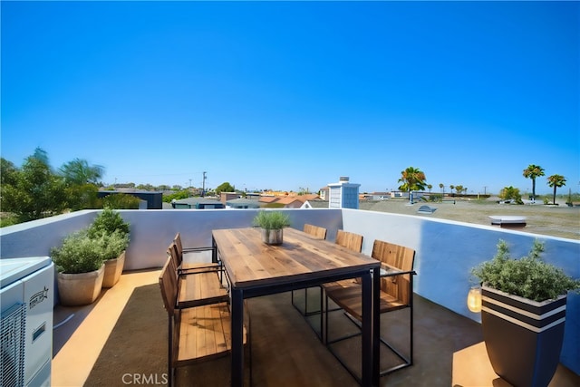 308 13th St, Seal Beach, CA 90740 - view of patio featuring a balcony, ac unit, and outdoor dining area