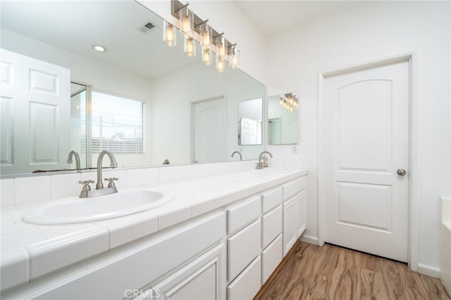 126 Schooner Ct, San Jacinto, CA 92583 - full bathroom with wood finished floors and double vanity