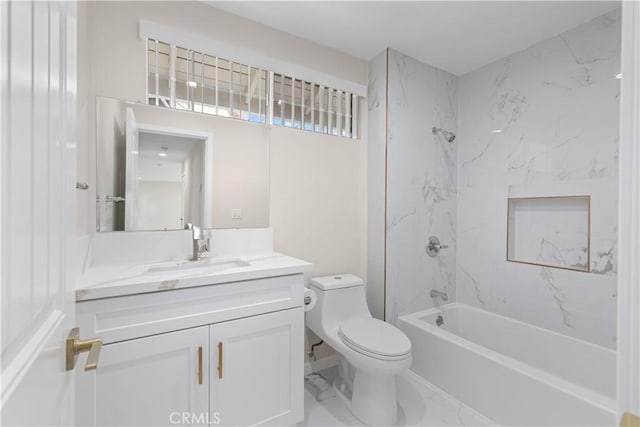 bathroom featuring toilet, vanity, and washtub / shower combination