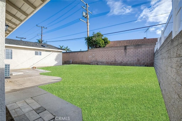 view of yard with a patio and central AC
