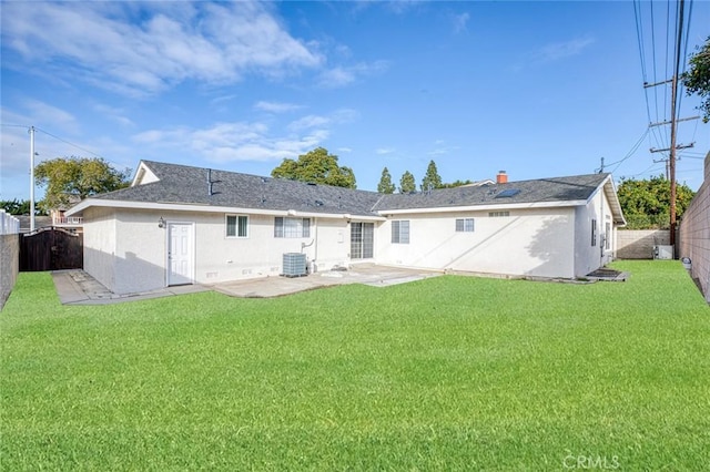 back of property featuring a patio area, stucco siding, and central AC