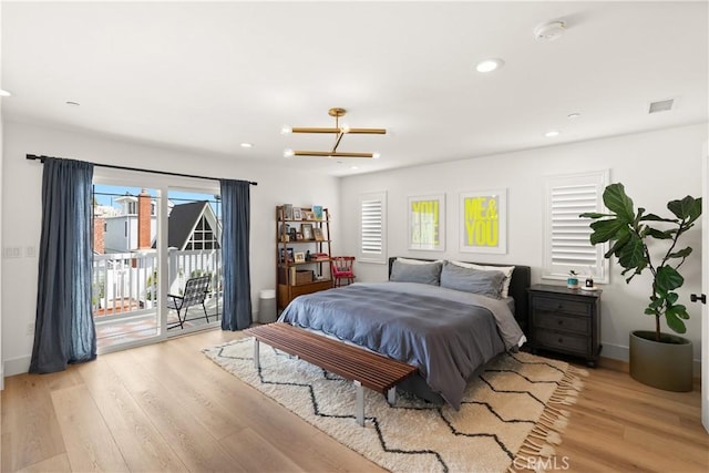 315 Lugonia St, Newport Beach, CA 92663 - bedroom with access to exterior, multiple windows, light wood-style floors, and recessed lighting