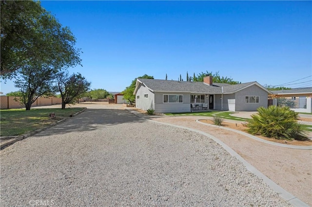 5136 W W Ave L8, Lancaster, CA 93536 - single story home with driveway and a chimney
