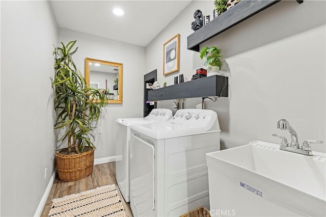 5136 W W Ave L8, Lancaster, CA 93536 - washroom featuring washing machine and clothes dryer, wood finished floors, baseboards, and recessed lighting