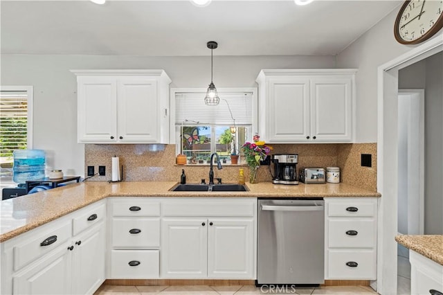 5136 W W Ave L8, Lancaster, CA 93536 - kitchen featuring stainless steel dishwasher, a sink, tasteful backsplash, and white cabinetry