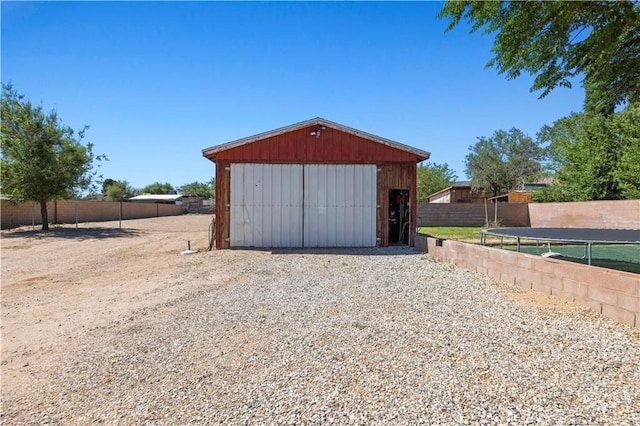 5136 W W Ave L8, Lancaster, CA 93536 - view of pole building with a trampoline