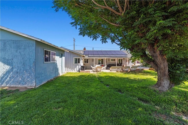 5136 W W Ave L8, Lancaster, CA 93536 - view of green lawn featuring a patio area