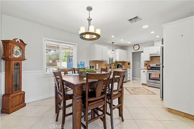 5136 W W Ave L8, Lancaster, CA 93536 - dining area featuring light tile patterned flooring, a chandelier, baseboards, and recessed lighting