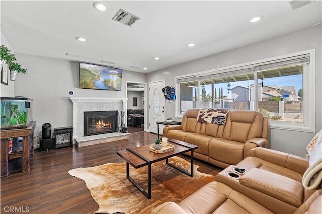 5136 W W Ave L8, Lancaster, CA 93536 - living area with wood finished floors, a glass covered fireplace, and recessed lighting