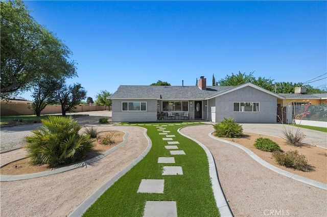 5136 W W Ave L8, Lancaster, CA 93536 - ranch-style house featuring driveway and a chimney