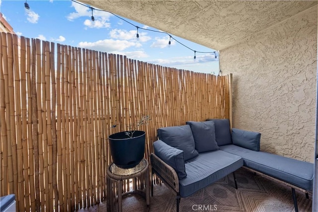 view of patio with a balcony