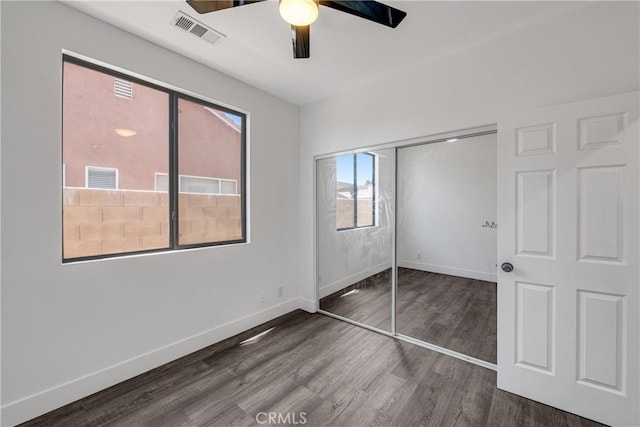 47432 Bahama Ct, Indio, CA 92201 - unfurnished bedroom with wood finished floors, baseboards, a closet, and a ceiling fan