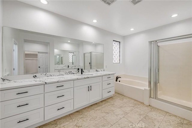 47432 Bahama Ct, Indio, CA 92201 - full bath with a shower stall, a bath, double vanity, and recessed lighting
