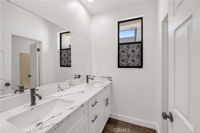 47432 Bahama Ct, Indio, CA 92201 - full bath with baseboards, wood finished floors, and double vanity