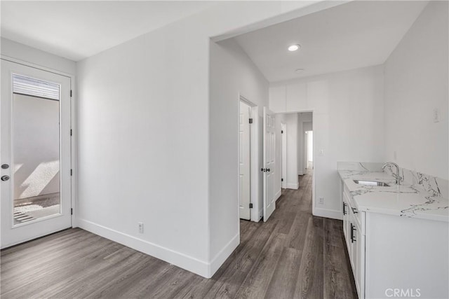 47432 Bahama Ct, Indio, CA 92201 - laundry room featuring a sink, dark wood finished floors, baseboards, and recessed lighting