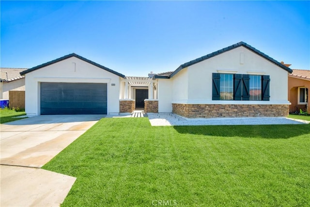 47432 Bahama Ct, Indio, CA 92201 - view of front of house with an attached garage, stucco siding, a tile roof, and stone siding