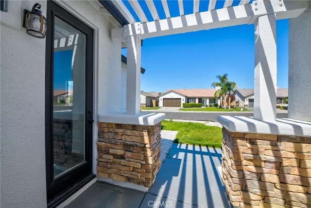 47432 Bahama Ct, Indio, CA 92201 - view of patio / terrace featuring covered porch and a residential view