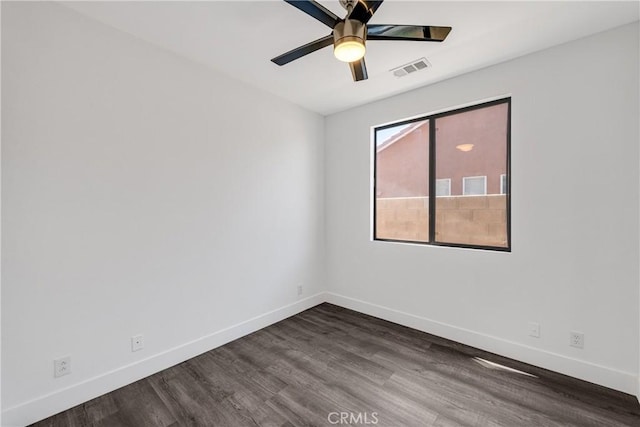 47432 Bahama Ct, Indio, CA 92201 - unfurnished room with baseboards, ceiling fan, and dark wood-style floors