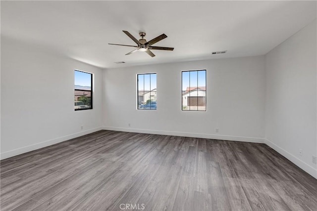 47432 Bahama Ct, Indio, CA 92201 - empty room with ceiling fan, wood finished floors, and baseboards