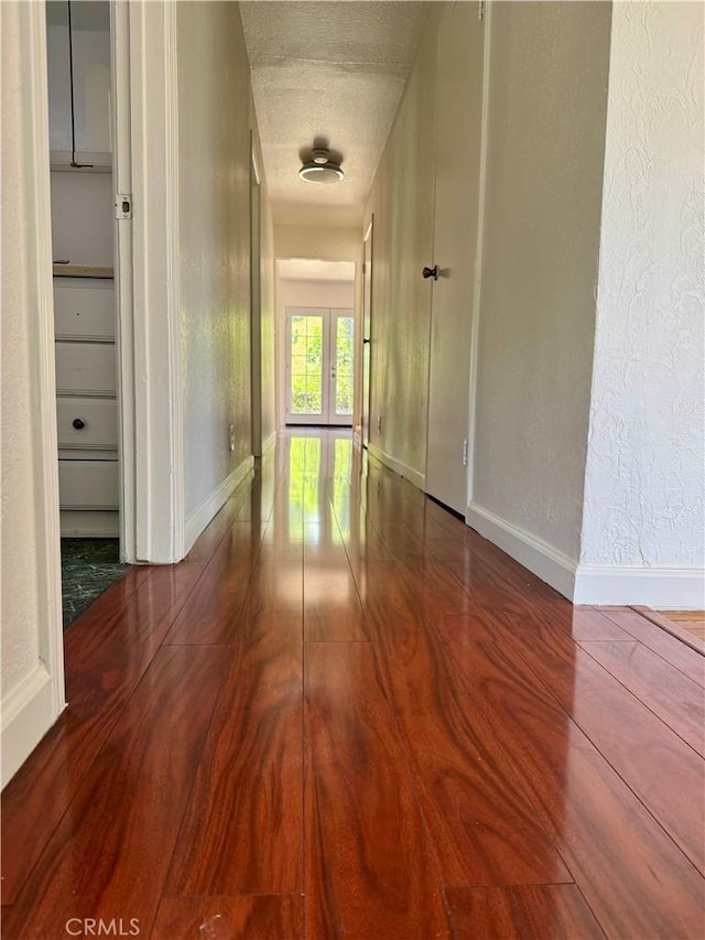 7019 Chimineas Ave, Reseda, CA 91335 - hall featuring baseboards, a textured ceiling, and a textured wall