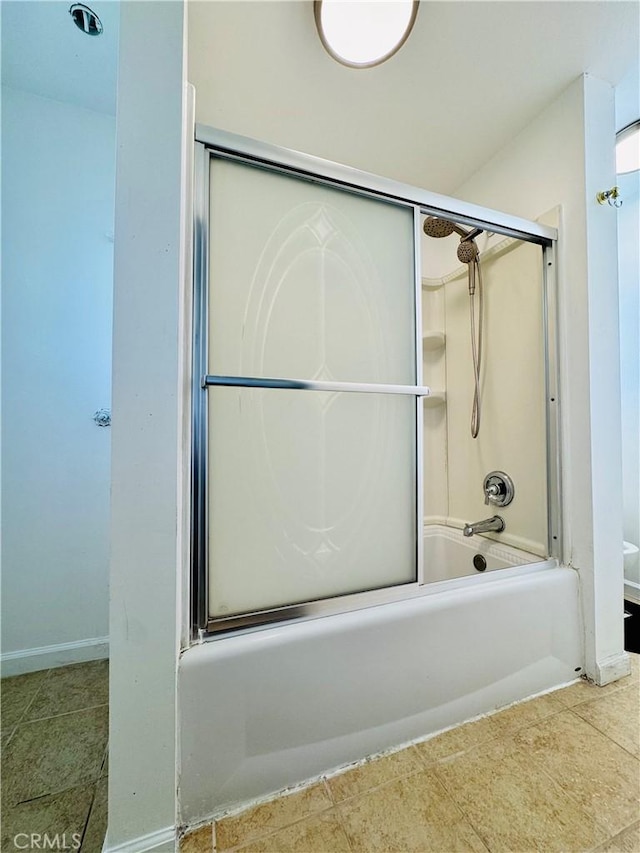 7019 Chimineas Ave, Reseda, CA 91335 - full bathroom featuring shower / bath combination with glass door and tile patterned flooring