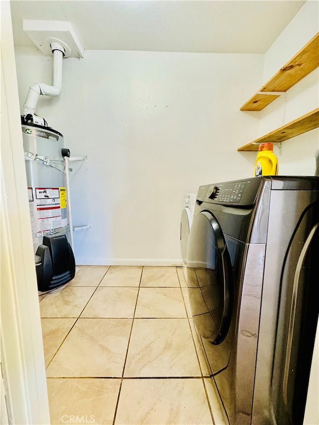 7019 Chimineas Ave, Reseda, CA 91335 - laundry area with separate washer and dryer, light tile patterned floors, gas water heater, and baseboards