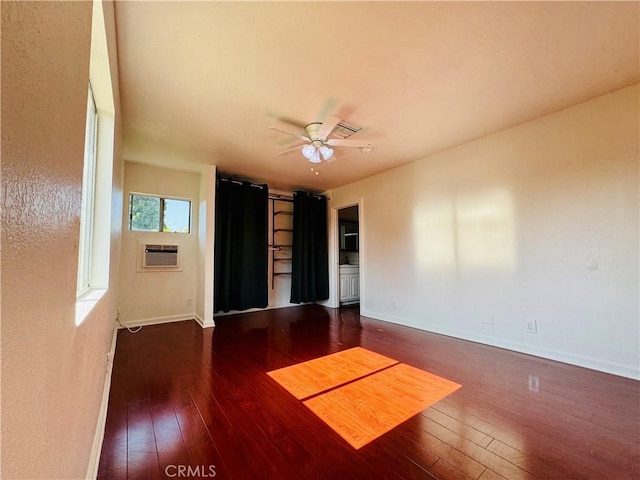7019 Chimineas Ave, Reseda, CA 91335 - spare room with hardwood / wood-style flooring, ceiling fan, baseboards, and a wall mounted air conditioner