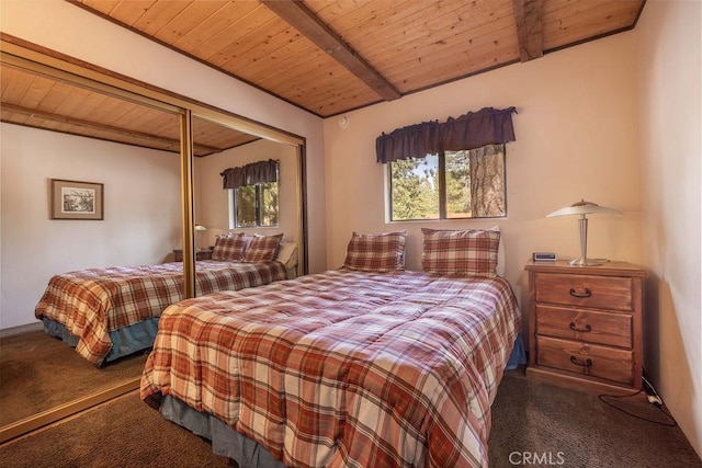 2032 Cedar Pine Ln, Big Bear City, CA 92314 - bedroom with carpet flooring, wood ceiling, beam ceiling, and a closet