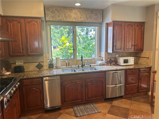 34300 Lantern Bay Dr Unit 41, Dana Point, CA 92629 - kitchen featuring a sink, dark stone counters, tasteful backsplash, and stainless steel appliances